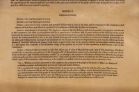 In the 2026 printing of the Maine State Constitution, the first to be printed in 150 years, three sections of Article X that had been redacted in 1876 were restored. From Sept. 21 to Oct. 1, Ladd Library hosted a display of three of the pages with restored language. Photo by Carly Philpott '27 for Bates College