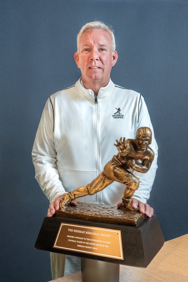 CEO holds trophy