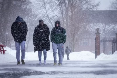 Over the woodlands brown and bare, over the harvest-fields forsaken, silent, and soft, and slow descends the snow. — Longfellow Back on campus after the February freak storm, Bates feels suspended between motion and stillness; cars crunch in half-melted tracks, boots drip by radiators, flights and plans still catching up somewhere in the clouds. Some of us are here, some are delayed, and the quiet holds space for both. It’s a strange return; rushed arrivals, late-night drives, weather maps open on our phones, yet the air itself feels calm, like the world pressed pause just long enough for us to notice it. The paradox is real; chaos in the forecast, steadiness on the quad. Snow does that. It softens edges, lowers voices, makes even a campus full of movement feel like it’s breathing slowly.