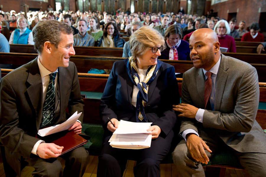 President Clayton Spencer and Matt Auer, dean of the faculty and vice president for academic affairs (left), talk with author and historian Peniel Joseph prior to his 2015 MLK Day keynote address at Bates. (Phyllis Graber Jensen/Bates College)