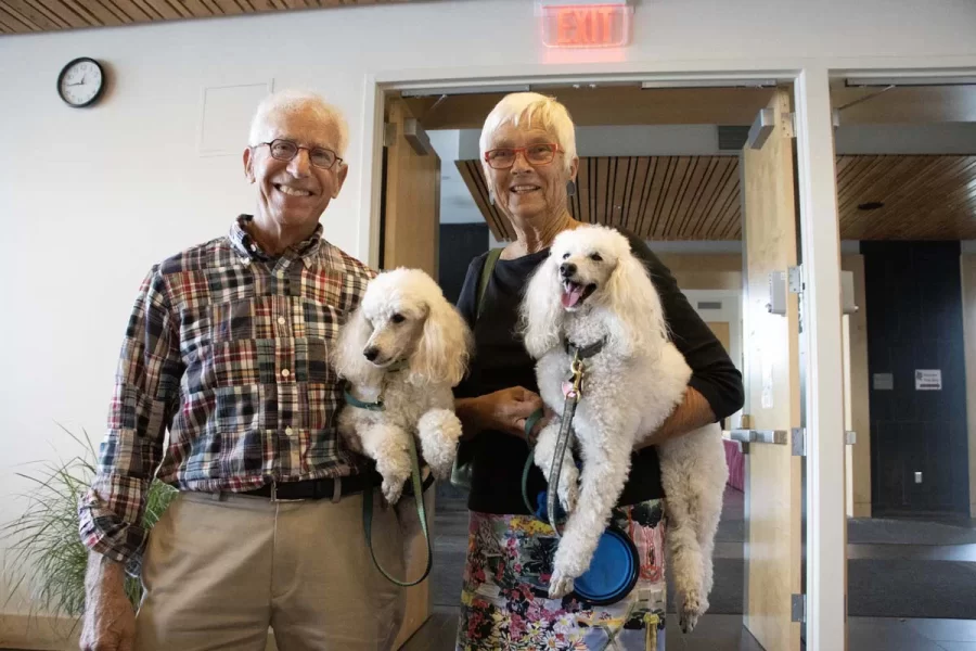 Welcome Center Check-in with two poodles