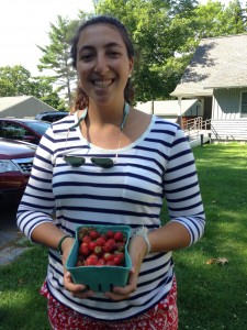 Sophie with some fresh Maine strawberries