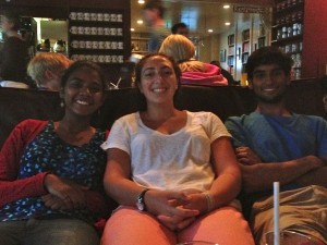 Roshni, Sophie, and Nabil waiting for dinner