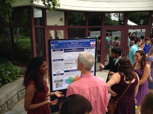 Students present their poster findings to Dr. Bob Morris from Wheaton College