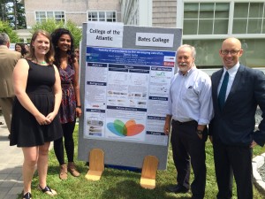 Larissa, Roshni, Professor Chris Petersen of COA, and President Darron Collins of COA