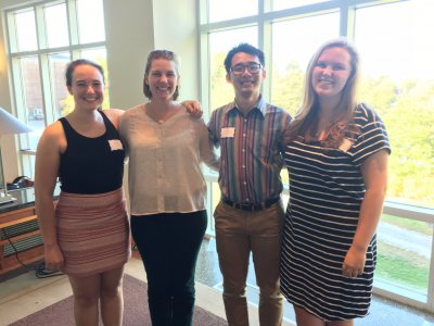 Alex, Larissa, Quang, and Maddie at the poster presentation